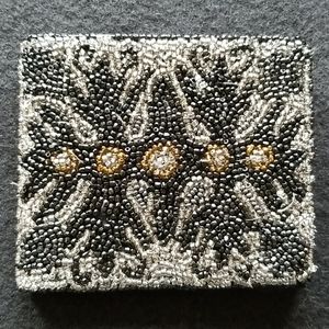 Beaded wallet by Walborg
